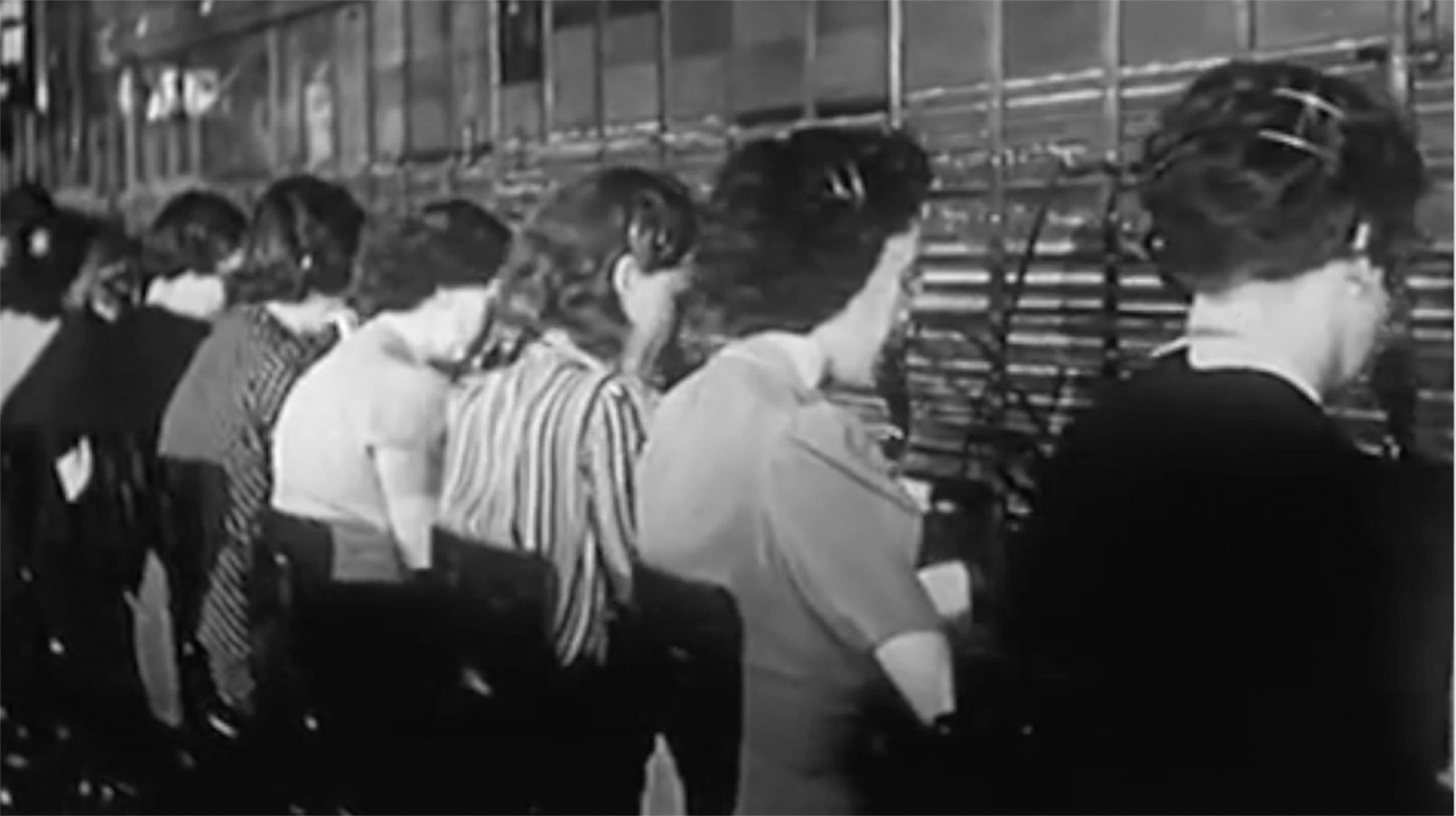 women feeding machines